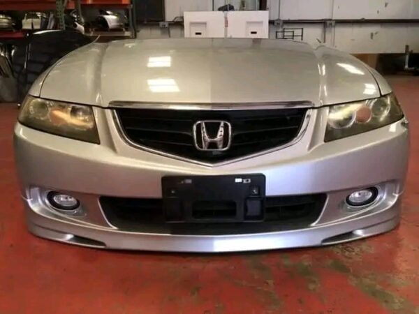 JDM Honda Accord Euro R CL7 / Acura TSX CL9 04-05 Front Conversion Clip Also Fits TSX 06-08 Includes: Front Bumper Front Euro R Lip Grill Headlights Fog Lights Radiator Support Radiator Radiator fans Left & Right Fenders Hood Will ship if need be.